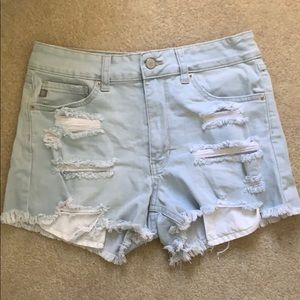 light washed ripped jean shorts